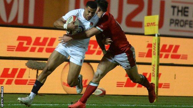 Anthony Watson runs with the ball against Wales