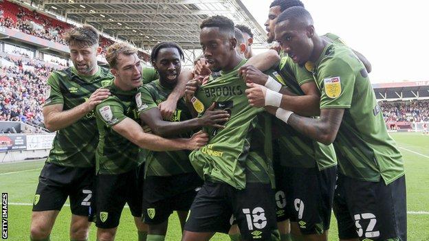 Bournemouth players celebrate their opening goal against Bristol City