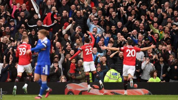 Jadon Sancho celebrates scoring Manchester United's third goal against Leicester