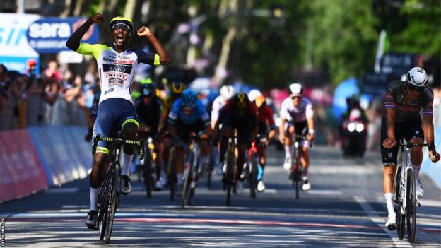 Biniam Girmay (centre) wins a stage of the Giro de Italia