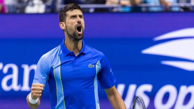 Novak Djokovic roars in his US Open match against Laslo Jaer