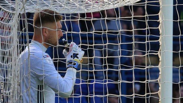Ipswich goalkeeper Tomas Holy stands in his goal