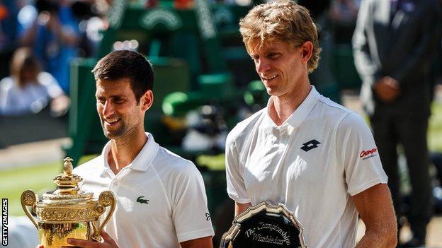Novak Djokovic and Kevin Anderson pose with their trophies following the 2018 Wimbledon men's singles final