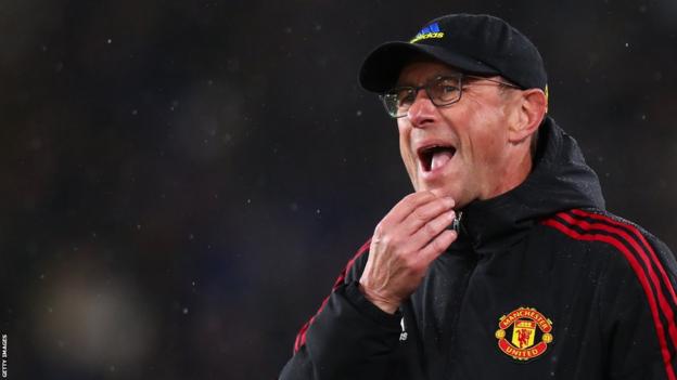 Ralf Rangnick strokes his chin