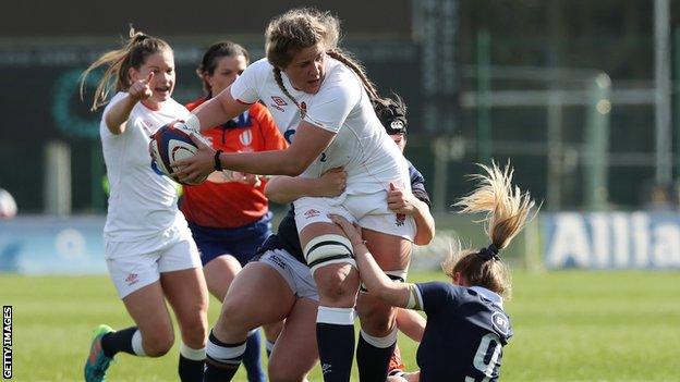 Abby Dow of England is injured as they are tackled by Hannah Jones of  News Photo - Getty Images