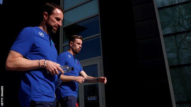 England manager Gareth Southgate and Jordan Henderson.