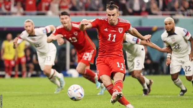 Gareth Bale scores from the penalty spot to level for Wales