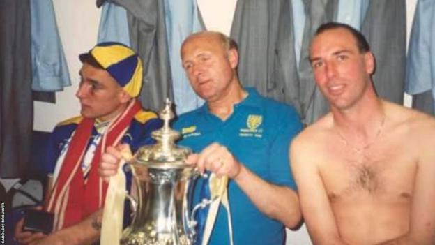 Vinnie Jones, Don Howe and Alan Cork with the FA Cup successful  the Wimbledon dressing room