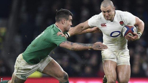 Mike Brown is tackled by Conor Murray