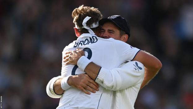 Stuart Broad embraces James Anderson