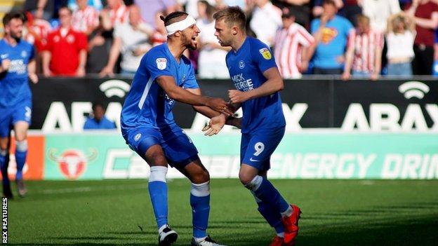 Matt Godden (right) celebrates.