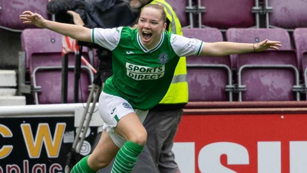 Abbie Ferguson celebrates after her cross is deflected in off the knee of the Hearts keeper