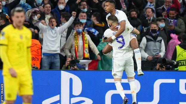 Real Madrid's players celebrate scoring against Chelsea in the Champions League