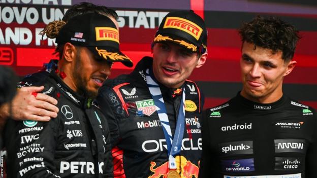 Lewis Hamilton, Max Verstappen and Lando Norris on the podium at the United States Grand Prix