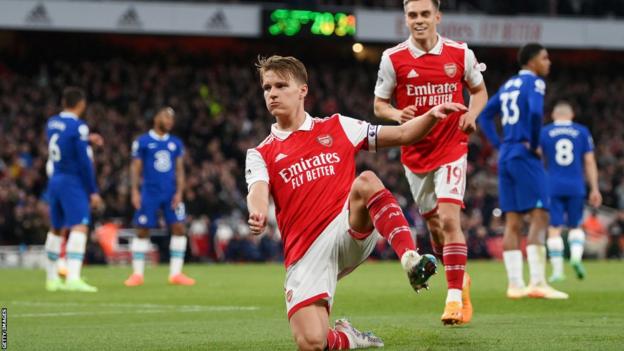 Martin Odegaard celebrates his second goal against Chelsea