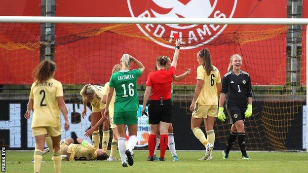 Jackie Burns was sent off for fouling Tessa Wullaert outside the area in the second half