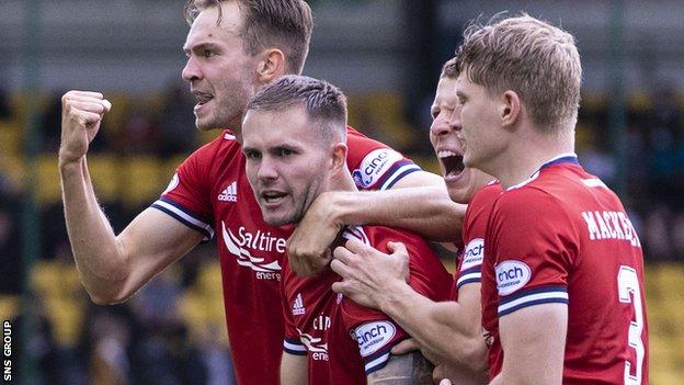 Aberdeen players celebrate