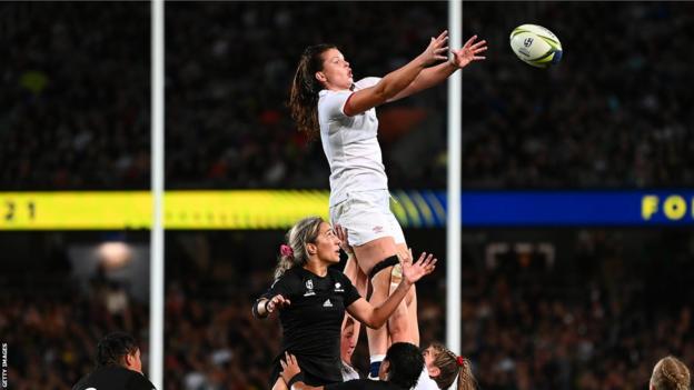 Abbie Ward reaches for the ball as she is lifted into the air from a line-out during the World Cup final in 2022