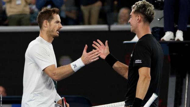 Andy Murray and Thanasi Kokkinakis shake hands at the net