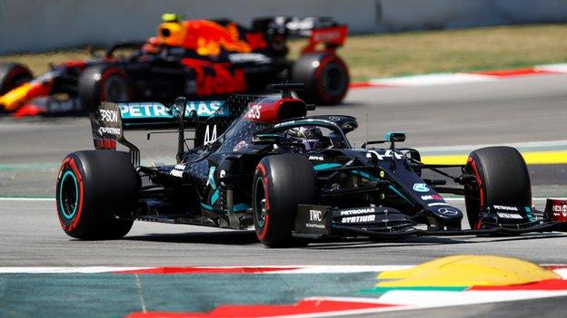 Max Verstappen and Lewis Hamilton on track in Barcelona