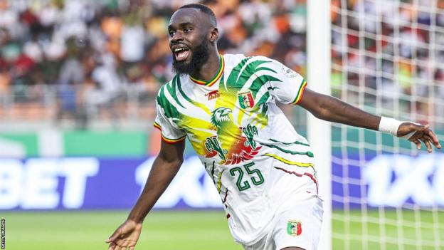 Lassine Sinayoko celebrates a goal for Mali against Burkina Faso at the 2023 Africa Cup of Nations