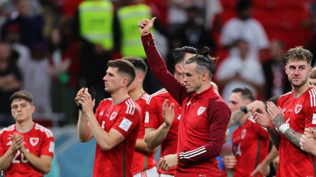 Captain Gareth Bale and the Wales players salute fans after their World Cup exit at the hands of England