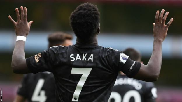 Bukayo Saka celebrates a goal against Aston Villa