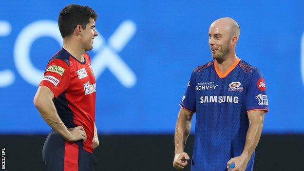 Chris Lynn (right) and Moises Henriques are two of Australia's players still in the IPL