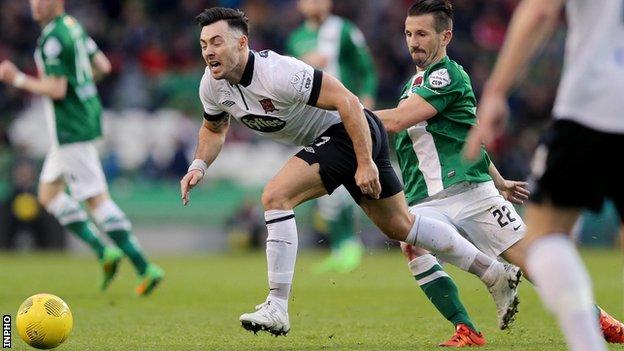 Richie Towell tries to burst away from Cork's Liam Miller in the FAI Cup Final