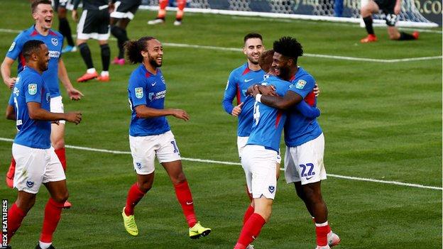 Ellis Harrison celebrates his goal for Portsmouth against Birmingham City
