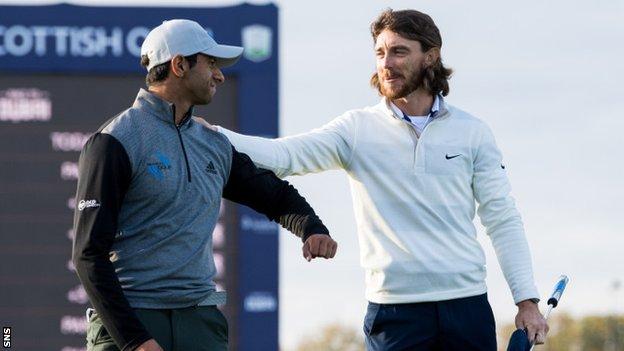 Aaron Rai is congratulated by Tommy Fleetwood after winning the 2020 Scottish Open