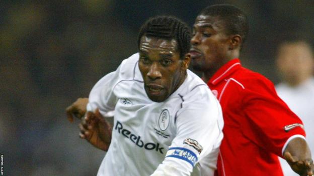 George Boateng sets about a tackle on Jay-Jay Okocha