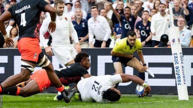 Manu Tuilagi scoring for England against Fiji