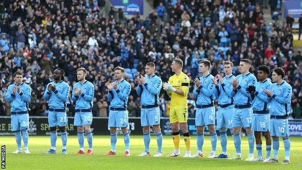 34 years on from the club's greatest day, Coventry City's current players led the pre-match minute's applause for former Sky Blues boss John Sillett