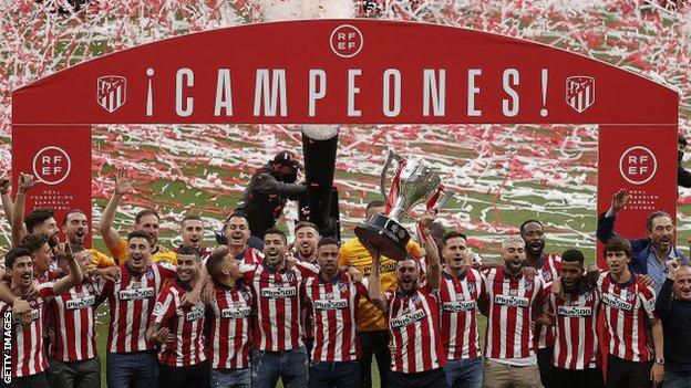 Atletico Madrid lift the La Liga trophy after being champions in 2020-21