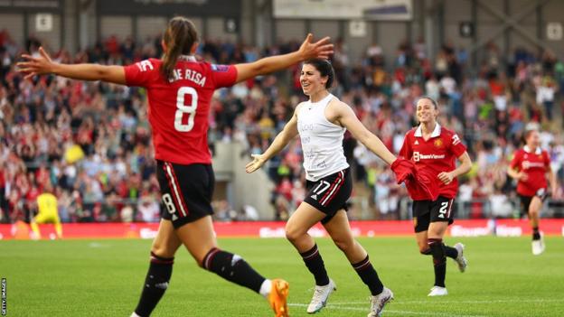 Lucia GArcia celebrates goal