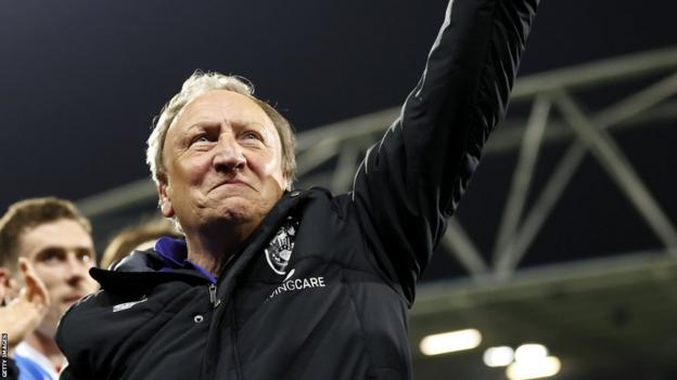 Neil Warnock: Huddersfield Town boss signs new one-year deal to remain with club