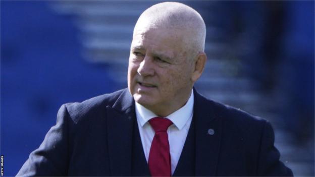 Warren Gatland watches his team warm up in Rome