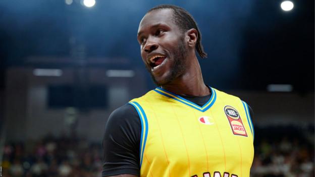 Former Louisville Cardinals junior captain Mangok Mathiang playing basketball for Australian side Illawarra Hawks