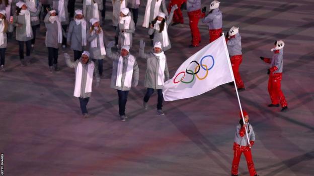 Russian walk out under the Olympic flag