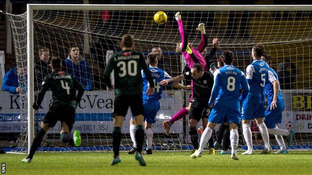 Robbie Thomson cannot hold Lewis Toshney's cross