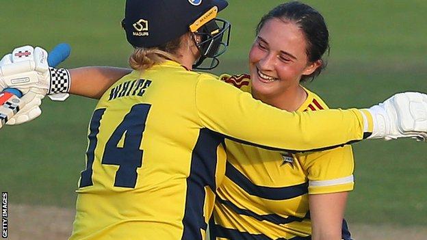 Kirstie White and Alice Capsey celebrate South East Stars winning the Charlotte Edwards Cup