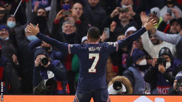 Kylian Mbappe celebrates his last-minute winner against Real Madrid