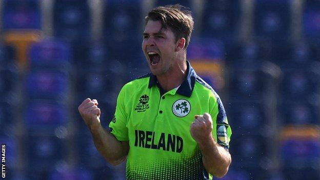 Ireland's Curtis Campher celebrates taking a wicket against Netherlands