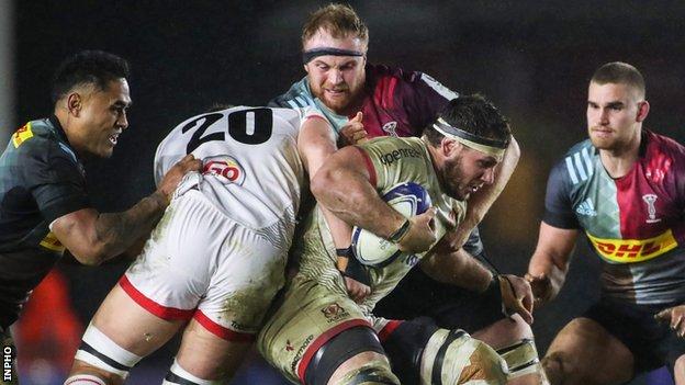 Ulster flanker Marcell Coetzee id tackled by Harlequins' James Chisholm