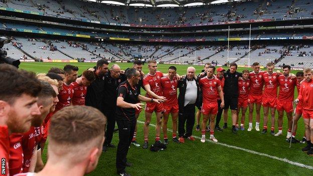 Tyrone joint-manager Brian Dooher gives a team talk at Croke Park after the Ulster Final