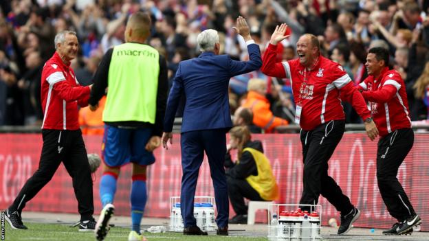 Andy Woodman (second right) - who was Crystal Palace goalkeeping coach at the time - celebrates with boss Alan Pardew after the Eagles score against Manchester United in the 2016 FA Cup final
