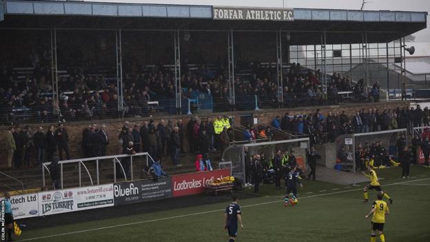 Spectators in a crowd of 446 watch the first half action as Edinburgh City look for their second successive away win