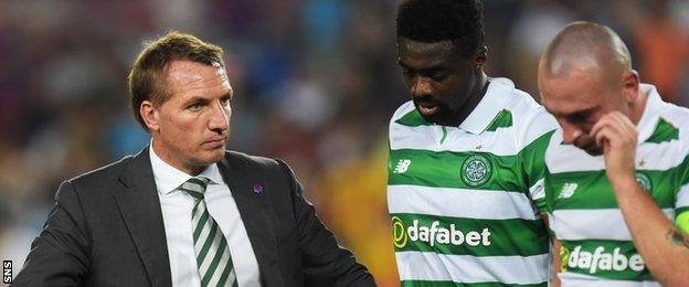 Brendan Rodgers consoles Kolo Toure and Scott Brown after the heavy defeat in Barcelona