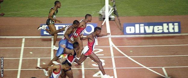 Carl Lewis wins the 1991 World Championships in a world record time of 9.86 seconds